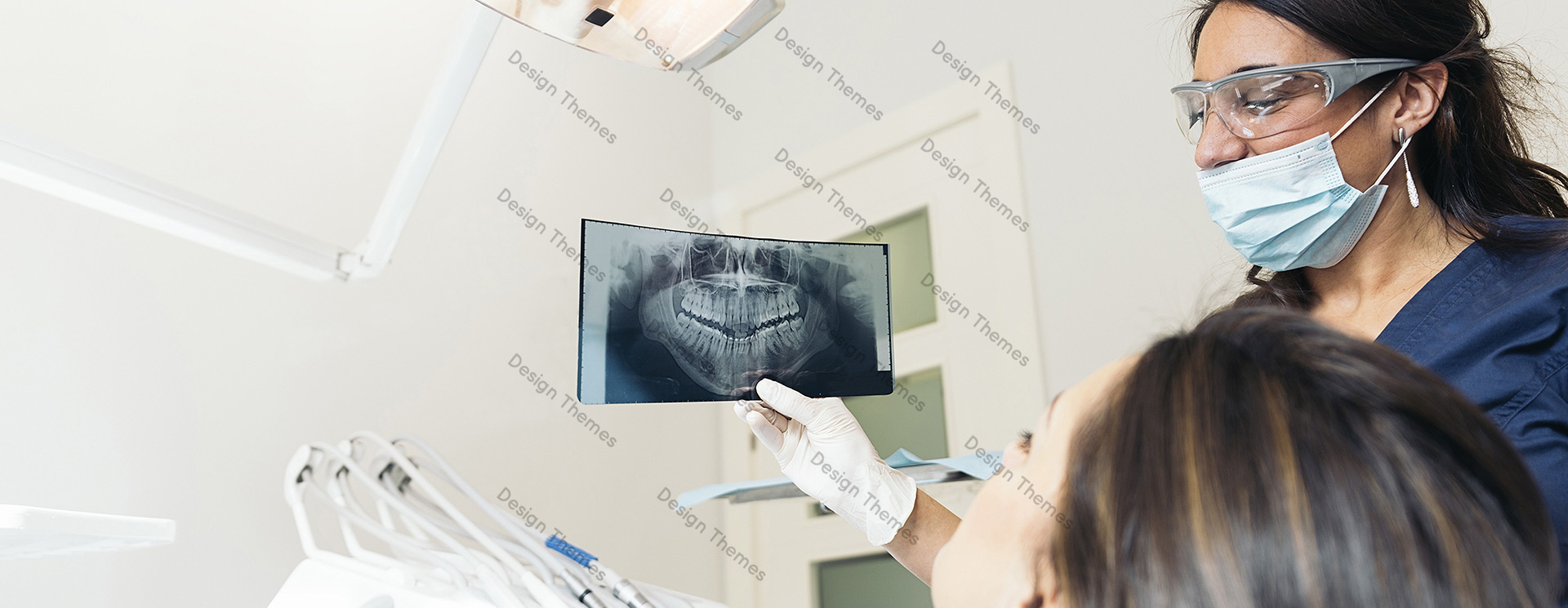 a dentist showing the report to the patient