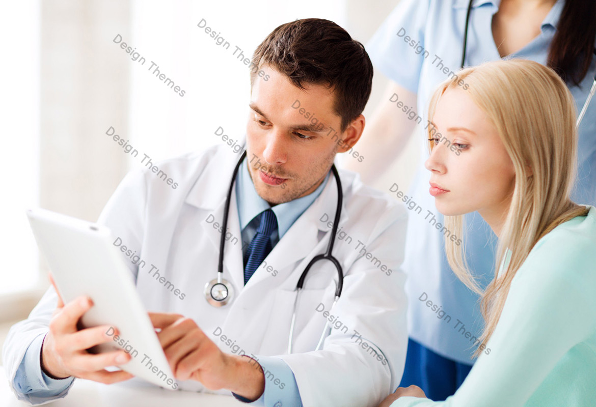 a dentist and a woman patient looking at tablet